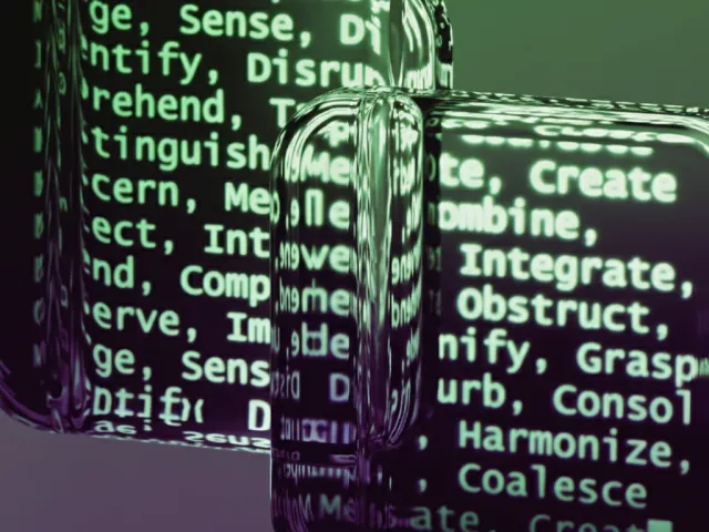 Close-up abstrato de dois objetos cilíndricos ou pilares espelhados, onde se reflete um código digital composto por palavras como 'Identify', 'Distinguish', 'Create', 'Combine'. A imagem possui um filtro de tons verdes e roxos escuros, transmitindo uma estética tecnológica e futurista.